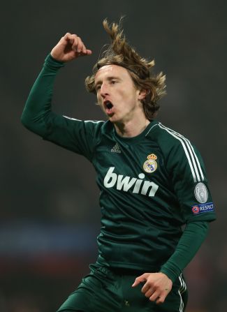 Luka Modric celebrates his stunning equalizer for Real Madrid after coming on as a second half substitute.