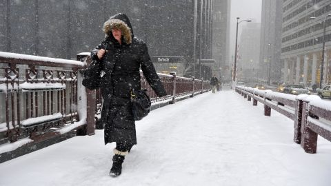 Jennifer Mosby crosses the Adams Street Bridge over the Chicago River on March 5 in the Windy City.