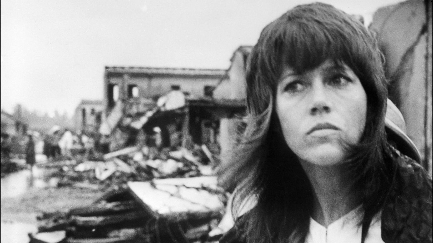 In 1972, actress Jane Fonda visited North Vietnam in protest of the Vietnam War. Fonda's visit to Hanoi was marked by a number of controversial events, including a photo showing Fonda seated on an anti-aircraft battery used against U.S. forces. Fonda later apologized for the photo. In this photo, Fonda tours destruction in Hanoi on July 25, 1972.
