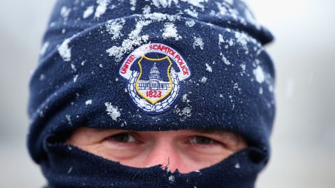U.S. Capitol Police officer Alex Rys' hat is dusted with snow as he patrols on Capitol Hill on March 6.