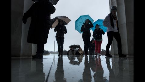 Tourists battle rain at the Lincoln Memorial on March 6.