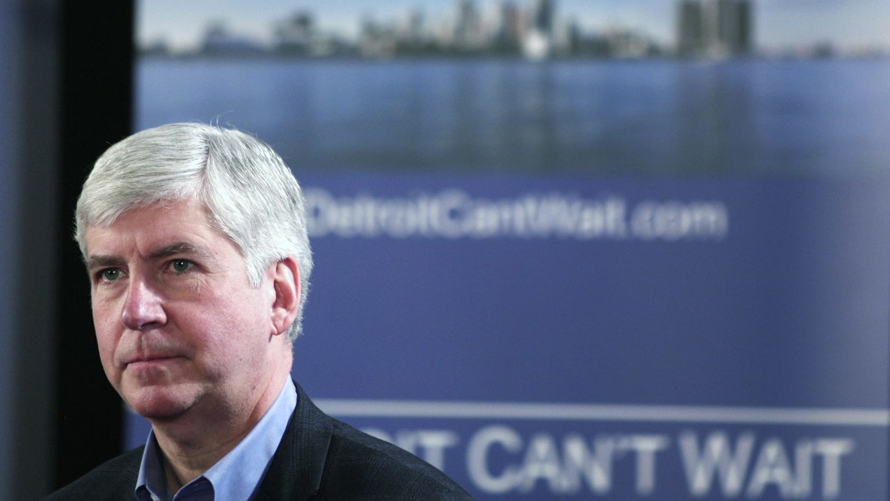 Michigan Republican Gov. Rick Snyder rejected gun rights advocates' push to sign a bill on Thursday, saying it could expose domestic violence victims.