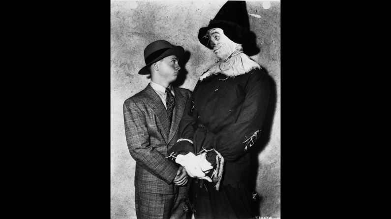 Ray Bolger as the Scarecrow visits with Mickey Rooney.