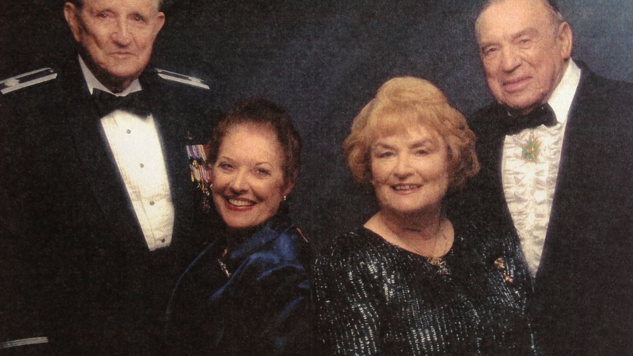 Charles Brown, with his wife, Jackie (left), found peace after his reunion with Franz Stigler, with his wife, Hiya.