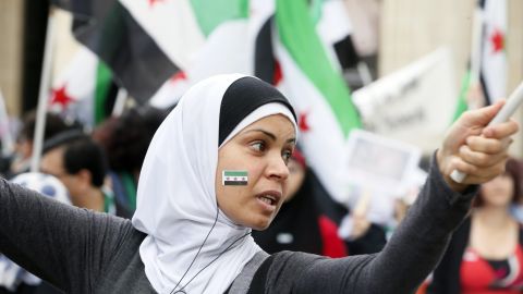 A woman participates in a demonstration in support of the Syrian people on July 7, 2012, in front of the Pantheon in Paris.