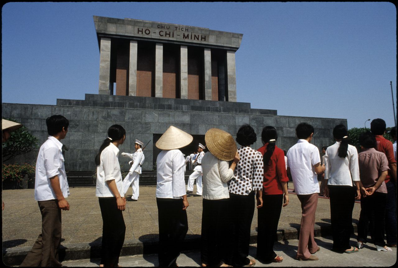 Vietnamese students line up to view the embalmed body of former president Ho Chi Minh at a mausoleum dedicated to him in Hanoi, Vietnam, in 1983.