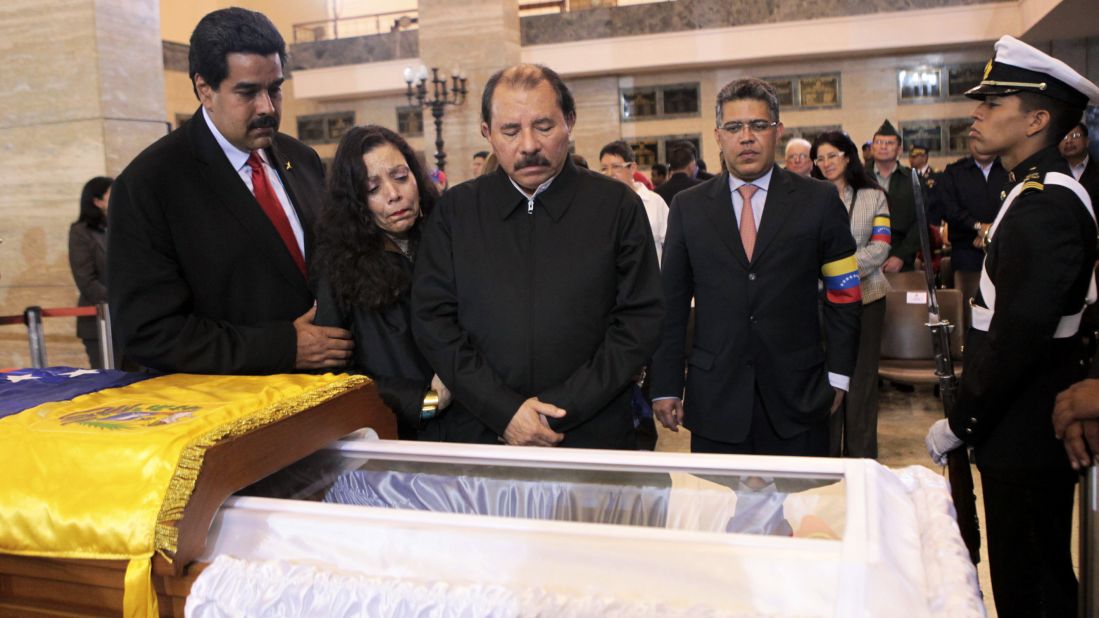 Nicaraguan President Daniel Ortega, center, views Chavez's body with his wife, Rosario Murillo, second left, on March 7.