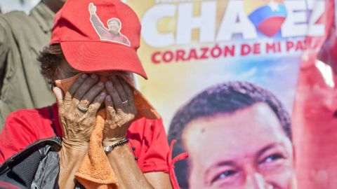 A Chavez supporter weeps outside of his funeral in Caracas on March 8.
