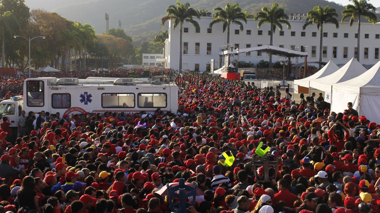 Supporters of Chavez gather as they wait for a chance to view his body on March 8.