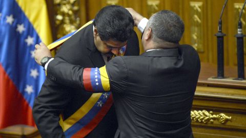 Vice President Nicolas Maduro is sworn in as president, which led to criticism from political opposition.
