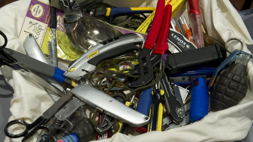 Knives, scissors and other banned items recovered at airport security checkpoints by the TSA.