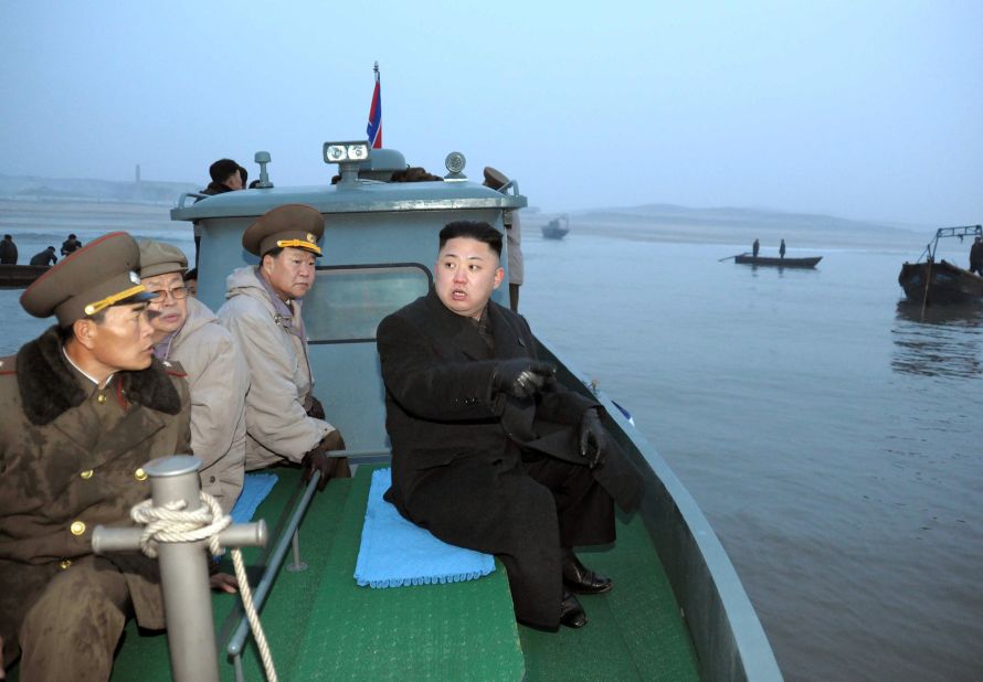 Kim arrives at Jangjae Islet by boat to meet with soldiers of the Jangjae Islet Defense Detachment in March 2013.