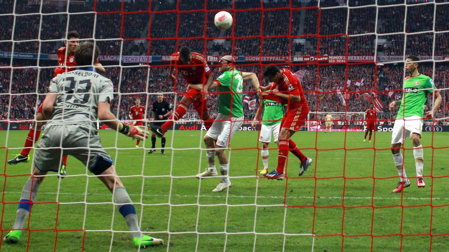 Jerome Boateng heads Bayern Munich to victory against Dusseldorf at the Allianz Arena on Saturday. 