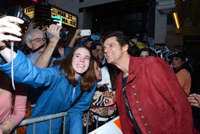 Actor Jim Carrey poses with a fan on March 8 before the SXSW screening of his film "The Incredible Burt Wonderstone."