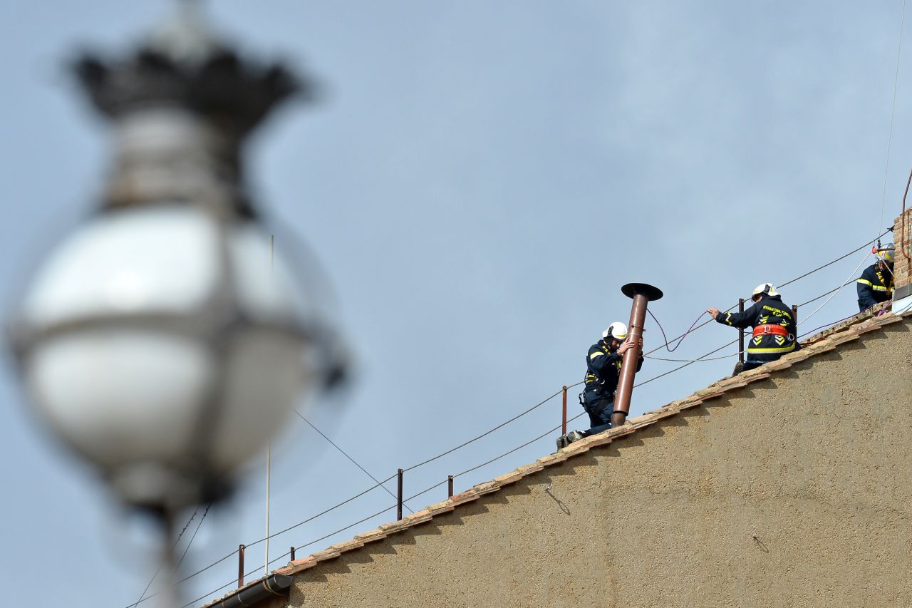 Vatican workers made final preparations on the Sistine Chapel on March 9.