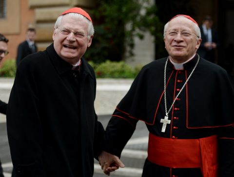 Italian Cardinals Angelo Scola (left) and Ennio Antonelli arrive for a pre-conclave meeting on Friday, March 8.