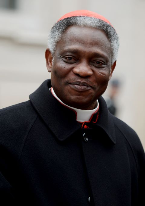 Cardinal Peter Kodwo Appiah Turkson of Ghana arrives at the Vatican on March 8.