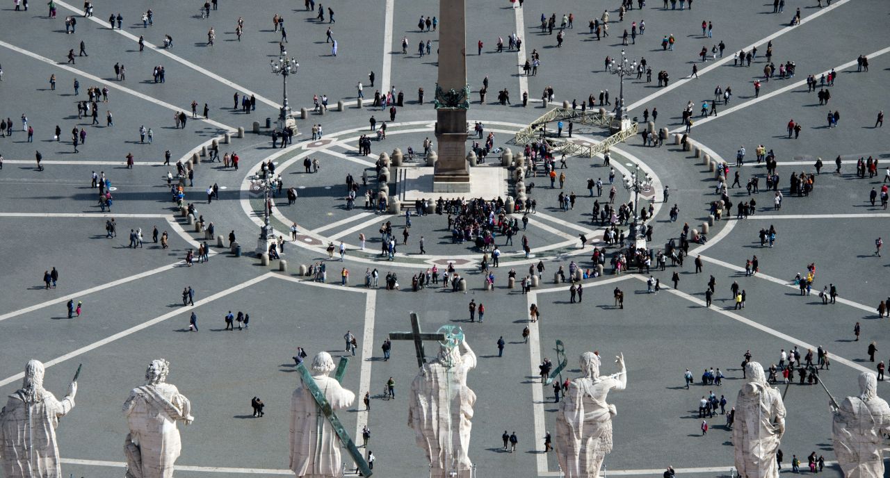 People gather at St. Peter's Square at the Vatican on Sunday, March 10, ahead of the cardinals' conclave.