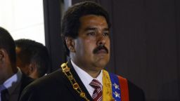 Venezuelan acting president Nicolas Maduro leaves after the ceremony in which he was sworn in, on March 8, 2013, in Caracas.