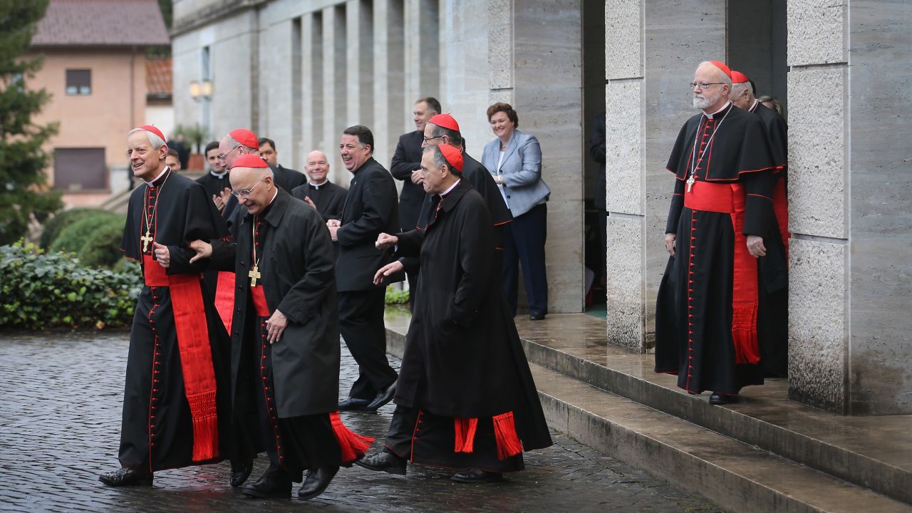  American Cardinals walk to a bus to take them from the North American College to St. Peter's Basilica where a special Mass will be celebrated before they enter the conclave to decide who the next pope will be on March 12, 2013 in Rome, Italy.