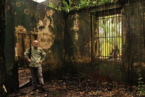 Stepping inside. Visitors can venture inside the abandoned cells on Ile St. Joseph, French Guiana.