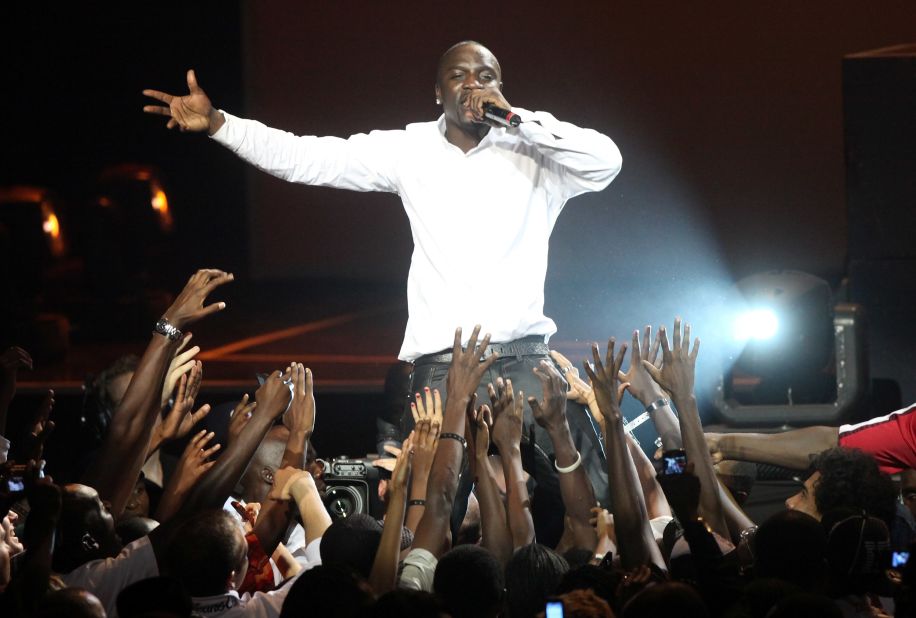 Born in Senegal, Akon has set up a foundation that's working to build schools and hospitals in the country. "I am going to keep advancing, doing as much as I can, but I really want to make the biggest impact in Africa," he says.<br />Pictured, Akon performing in Nairobi, Kenya, at the 2009 MTV Africa Music Awards.<br />