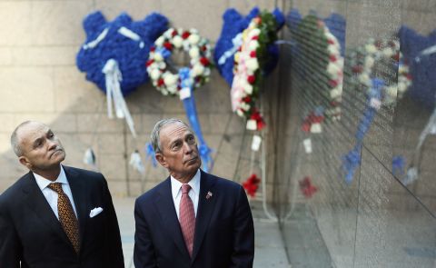 Bloomberg and New York Police Commissioner Ray Kelly look at the New York Memorial Wall during an unveiling in October 2012.  The city added the names of 15 officers who died the previous year.