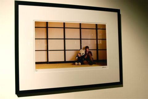 This picture, taken in around 1965, shows Lennon holding his son Julian's toy panda in a Japanese room. The print is has become one of the top sellers in the collection. 