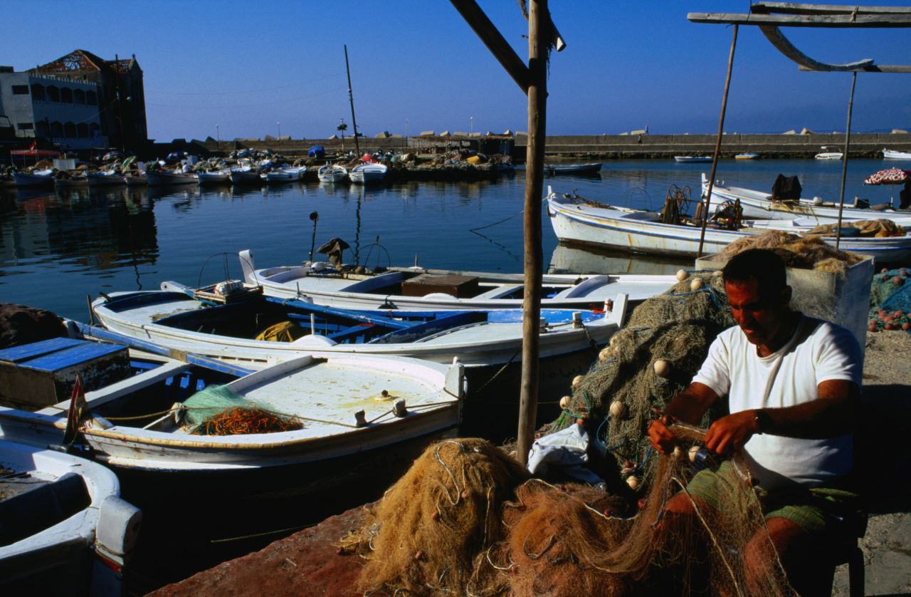 In Tyre, fishermen take boats out from the ancient harbor and return with fish to deliver to local restaurants.