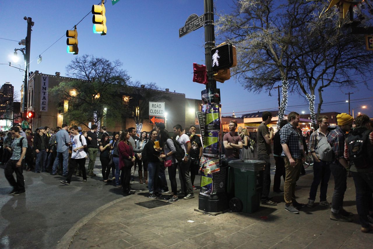 People crowd the streets outside the iHeartRadio showcase on March 12.