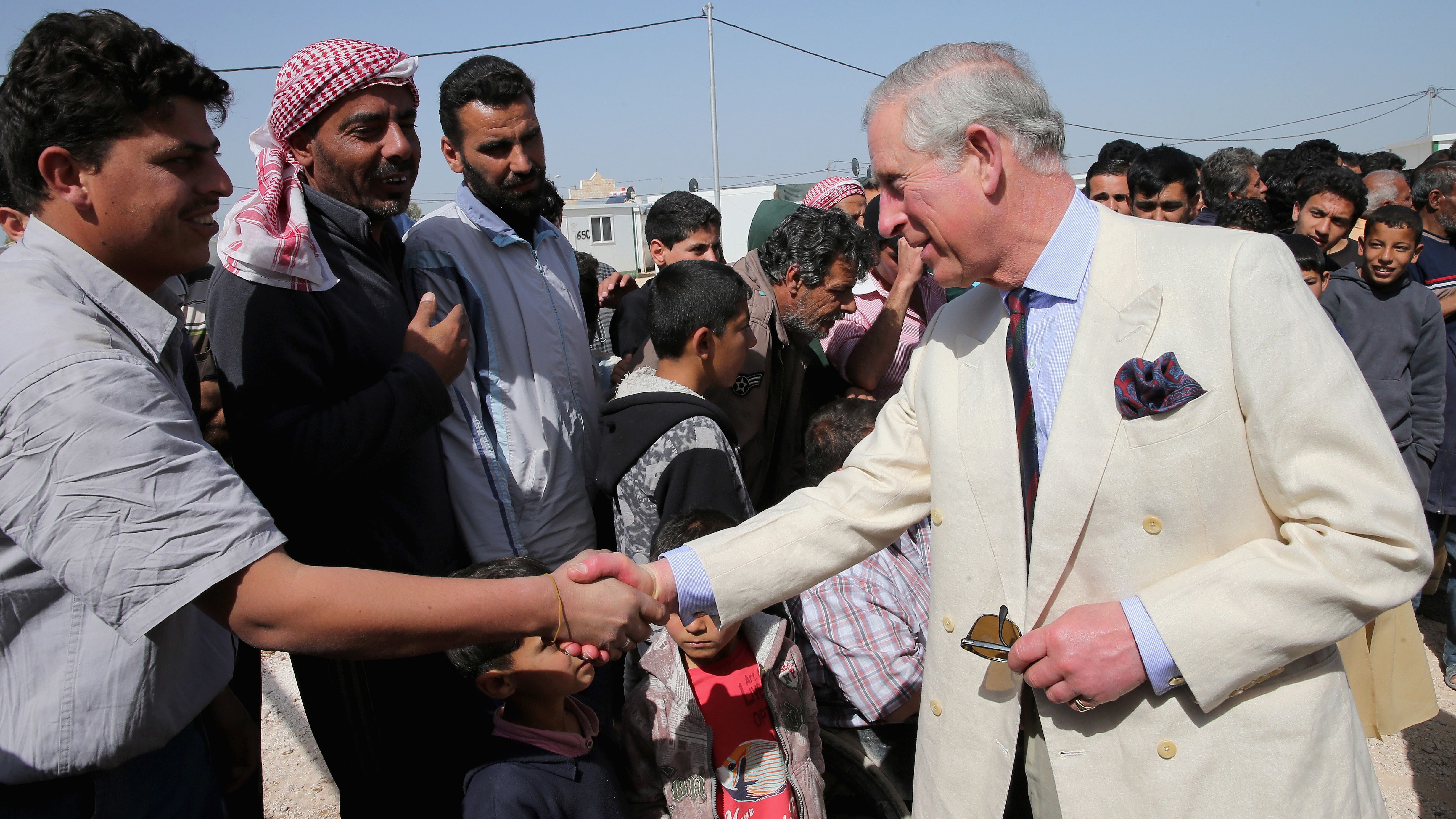  Prince Charles meets Syrian refugees in the King Abdullah Refugee Camp, 2 kilometers from the Syrian border. 