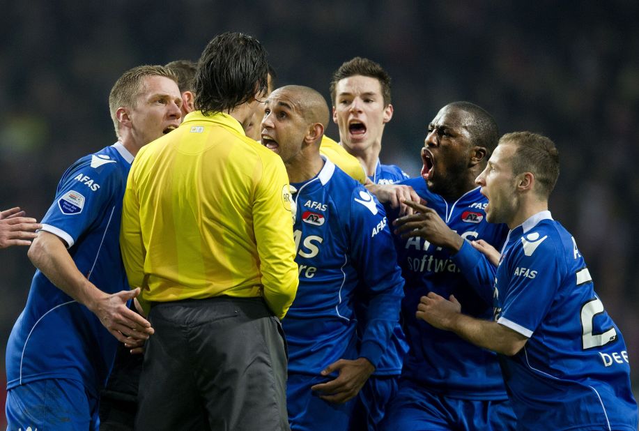 A year previously, AZ Alkmaar players angrily protested when referee Bas Nijhuis sent off the club's goalkeeper after he kicked out at a fan of opposing team Ajax who attacked him during a Dutch Cup match. 