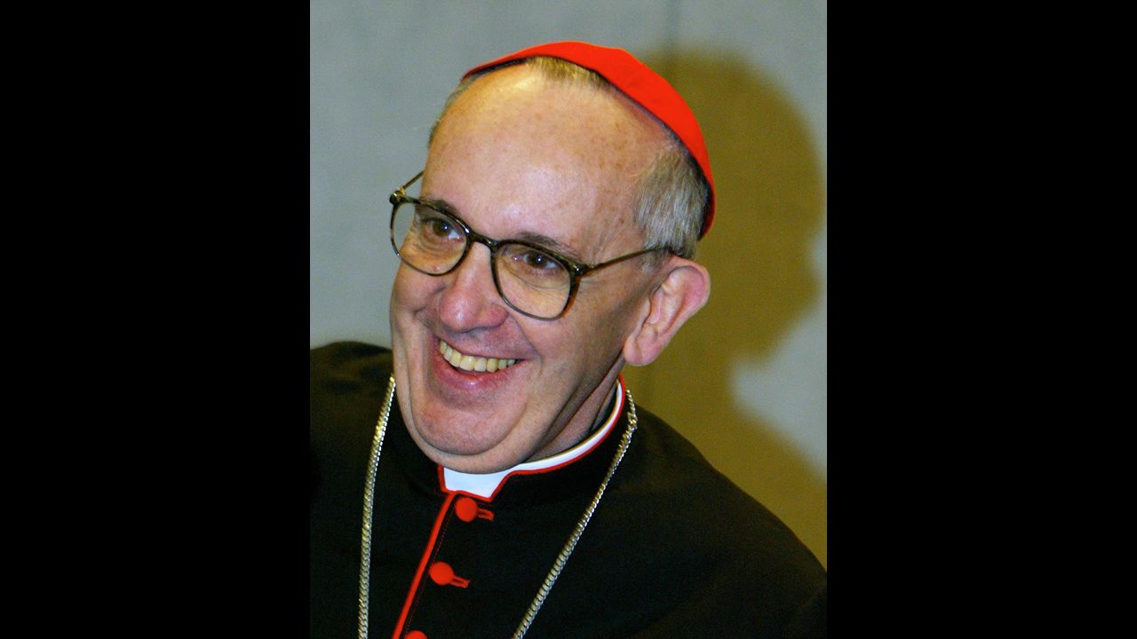 Bergoglio smiles during a news conference at the Vatican in October 2003. during celebrations marking the 25th anniversary of Pope John Paul II's election.