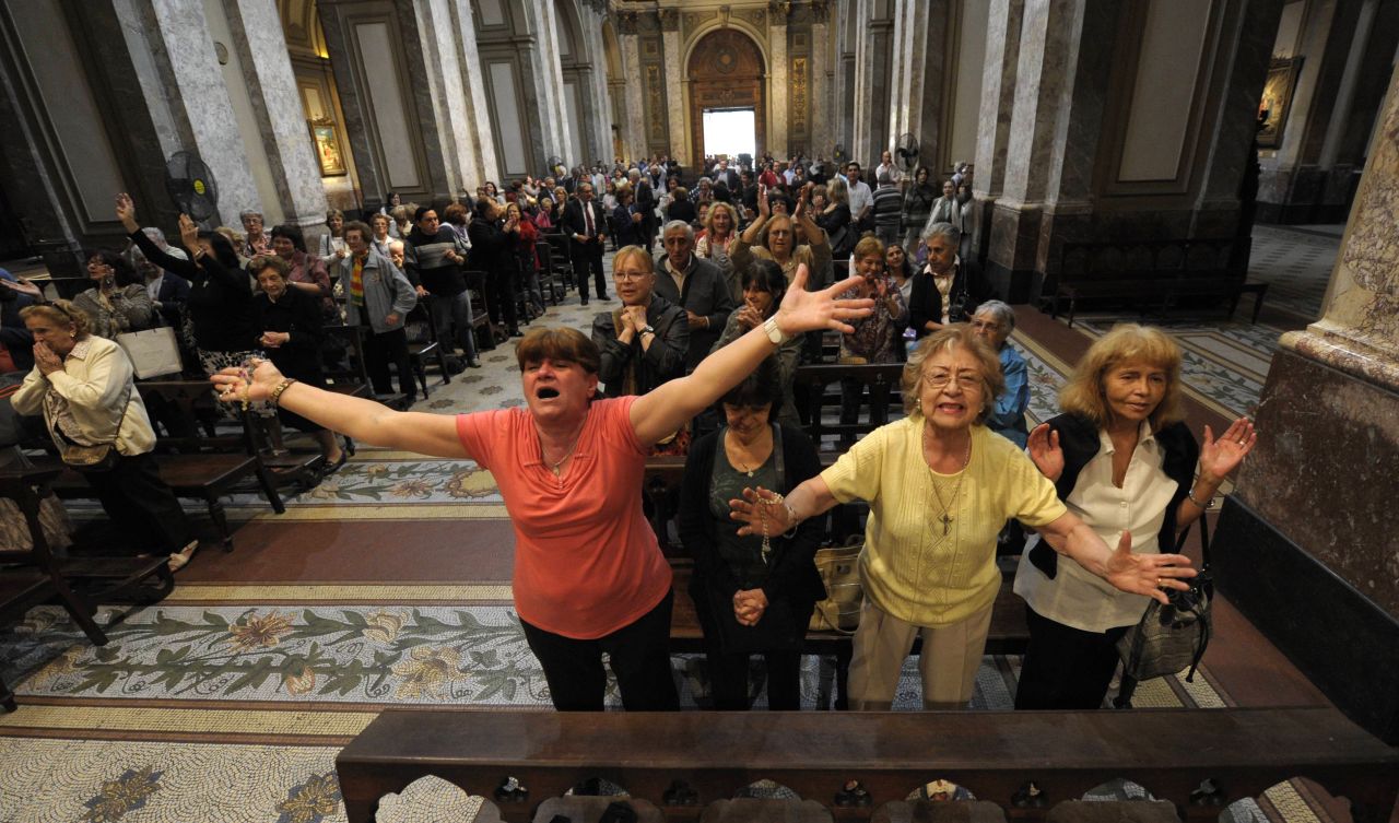Argentinians celebrate after the announcement that former Buenos Aires Archbishop Jorge Mario Bergoglio was elected pope at the Metropolitan Cathedral in Buenos Aires.