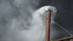 White smoke rises from the chimney on the roof of the Sistine Chapel meaning that cardinals elected a new pope on the second day of their secret conclave on March 13, 2013 at the Vatican.