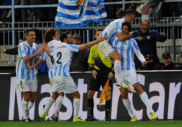 Substitute Roque Santa Cruz netted a 77th minute winner to make it 2-0 on the night and send Malaga through 2-1 on aggregate. 