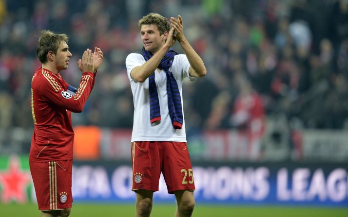 Bayern Munich duo Philipp Lahm and Thomas Muller look relieved after the 2-0 home defeat, a result which takes the German side through on away goals following a 3-3 overall draw.
