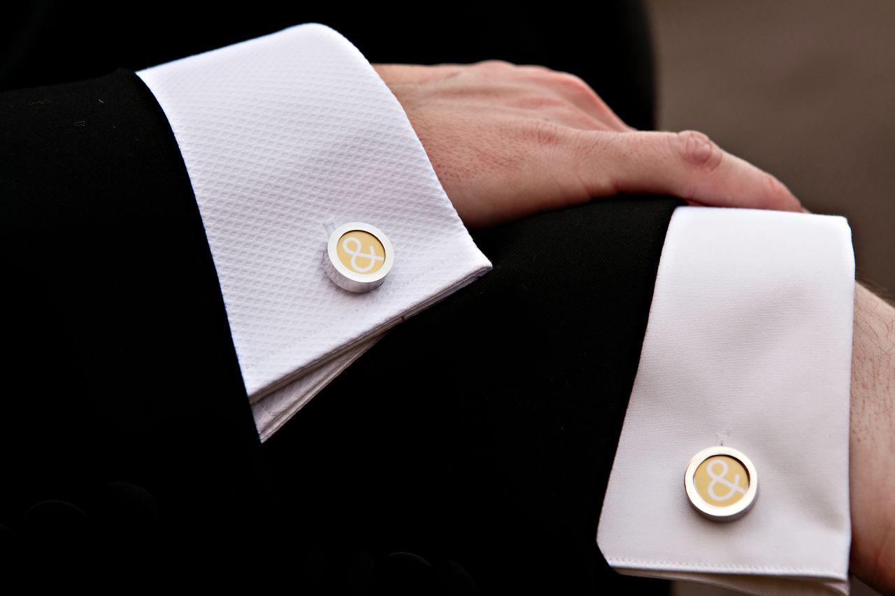 Detail shots offer a chance to capture the symbols and subtle touches of a wedding. "Photographing a groom's cuff links comes straight (ahem) from the traditional playbook," Hamm said. Here, that classic shot is reinvented by capturing different men's shirts to signify that two people are in the frame.