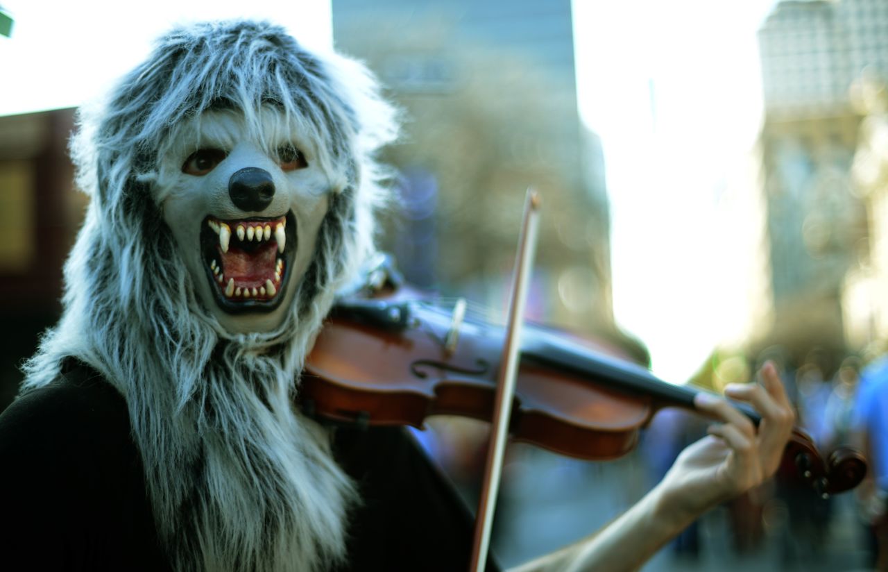 A musician performs on the street near the festival on March 13.