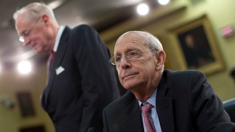 Supreme Court Associate Justices Anthony Kennedy (L) and Stephen Breyer await the start of a hearing on Capitol Hill March 14, 2013 in Washington, DC. 