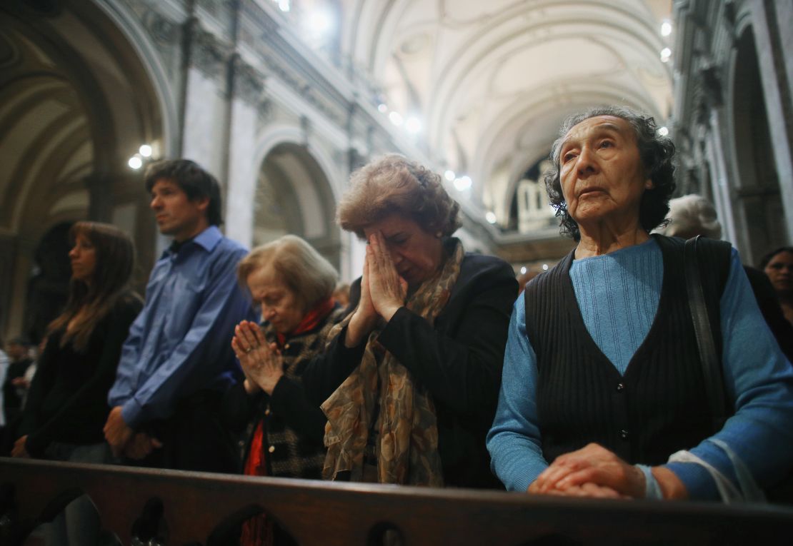 Argentines attend Mass at the Metropolitan Cathedral in Buenos Aires the day after Pope Francis was selected.