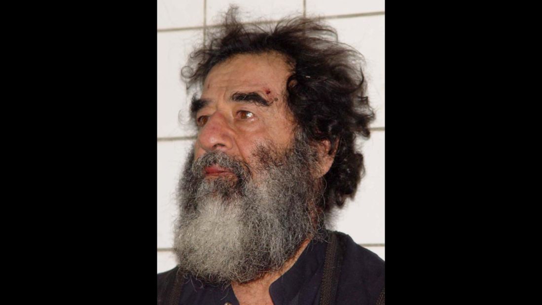 Saddam Hussein's picture is taken December 14, 2003, after his capture a day earlier. U.S. troops found Hussein hiding near his hometown of Tikrit.