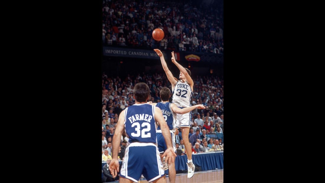 Christian Laettner of Duke University shoots the game-winning shot with 2.1 seconds remaining to beat Kentucky 104-103 in overtime during the tournament on March 28, 1992, in Philadelphia.