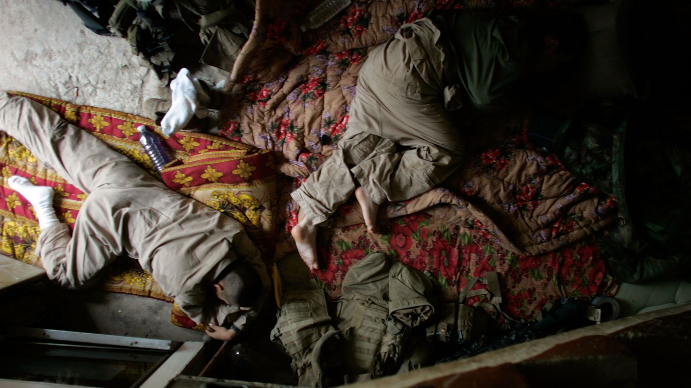 U.S. Marines sleep at their patrol base in the area known as Zaidon in Al Anbar province on May 12, 2007.