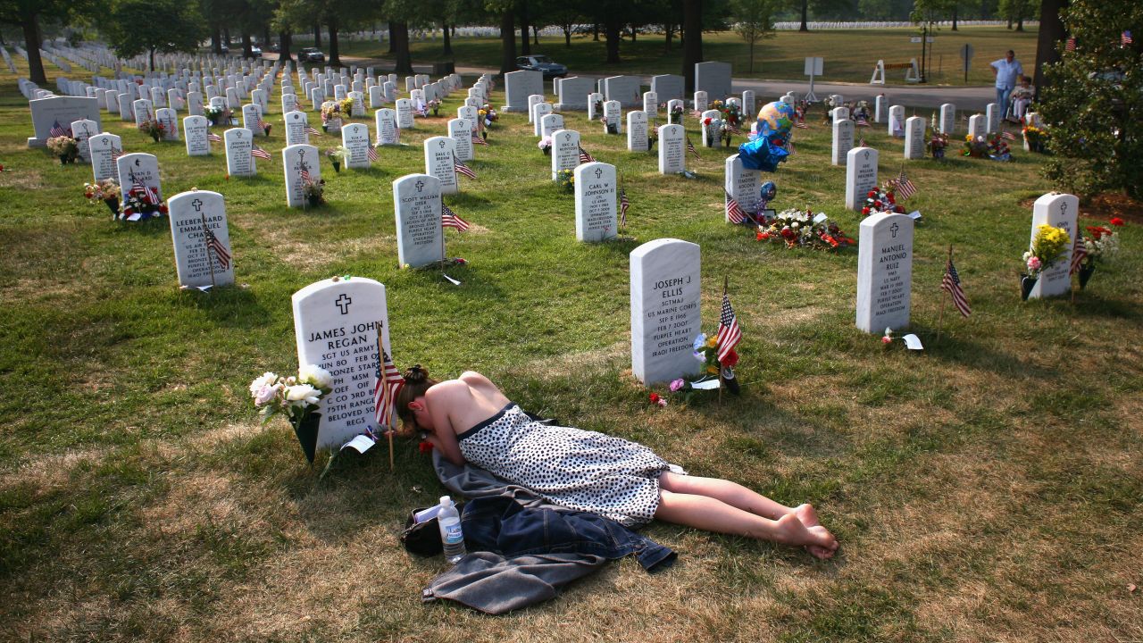 Mary McHugh mourns her fiance, Sgt. James Regan, at Arlington National Cemetery in Washington on May 27, 2007. The American Special Forces soldier was killed by an IED in Iraq in February.