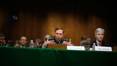 Commanding Gen. David Petraeus, center, and Ambassador Ryan Crocker testify before the Senate Armed Services Committee in Washington on April 8, 2008. In reporting on the success of the surge in Iraq, Petraeus said the number of U.S. troops in the country should not drop below 140,000.
