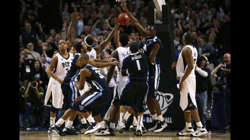 The Villanova Wildcats celebrate after Scottie Reynolds made the game-winning shot to beat the Pittsburgh Panthers 78-76 during the East Regionals of the tournament on March 28, 2009, in Boston.