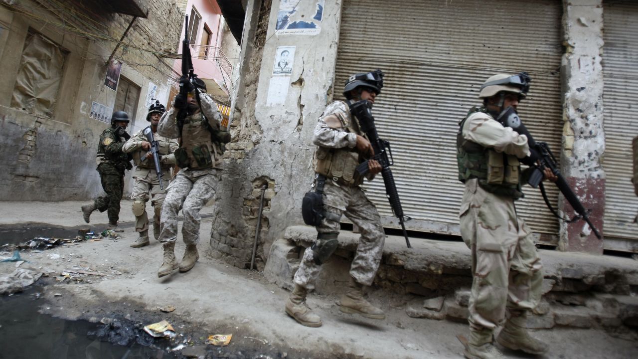 Iraqi army special forces patrol Baghdad's al-Fadel district on March 30, 2009. U.S.-backed Iraqi forces clashed with anti-al-Qaeda militants known as the Awakening Council, or Sahwa, after fighting erupted following the arrest of Adel Mashhadani, a Sahwa leader.