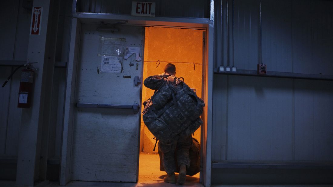 A U.S. soldier prepares to fly out of the Sather Air Base in Baghdad on December 15, 2011. The last U.S. forces left Iraq and entered Kuwait on December 18, nearly nine years after launching a divisive war to oust Saddam Hussein.