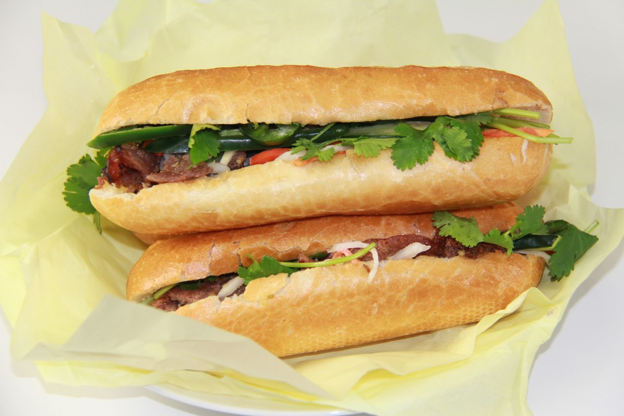 The Vietnamese bánh mì is a monument to balance. Fillings such as sweet barbecued pork or tofu mix perfectly with a filling of pickled carrots and daikon radish, cucumber, cilantro, mayo and jalapeño. Pictured: bánh mì from Saigon Vietnam Deli in Seattle.